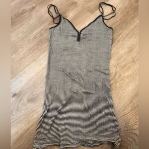 Free people slim black and white striped tank top 100% cotton size small